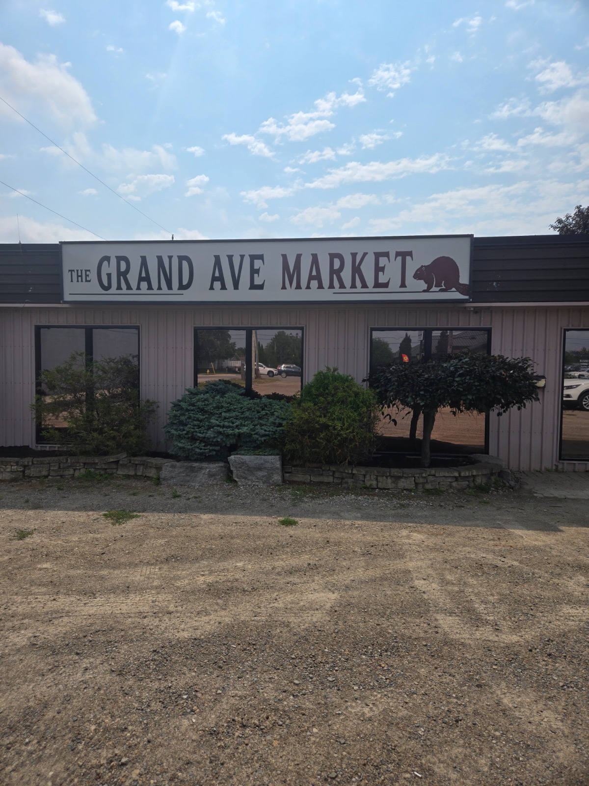 The Grand Ave Market storefront sign at 578 Grand Ave E, Unit A, Chatham