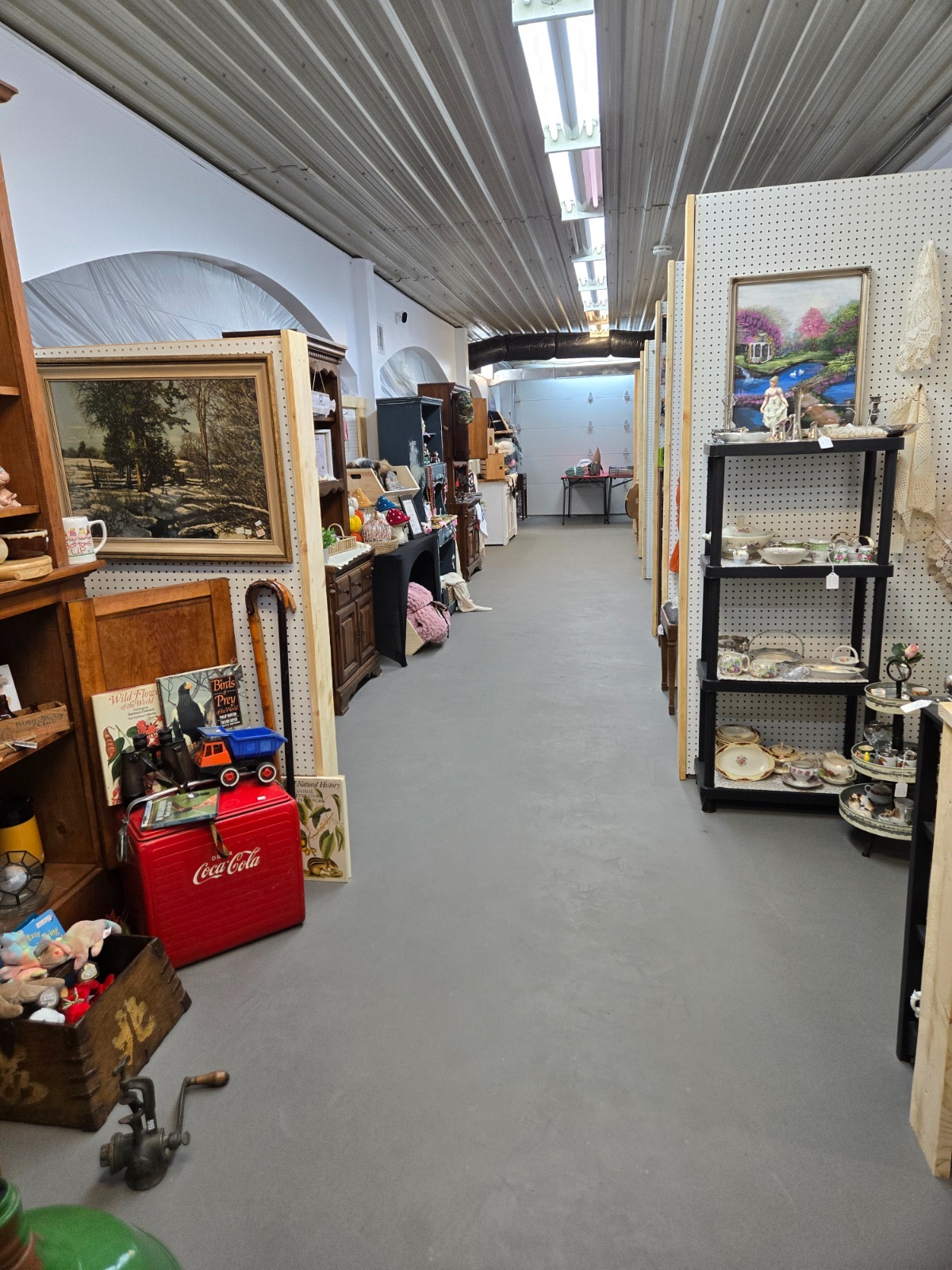 Inside The Grand Ave Market: vintage hutch, collectibles and vendor booths